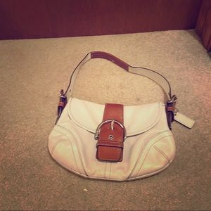 Small white and tan purse